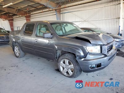 Czwarte zdjęcie samochodu z boku: 2012 HONDA RIDGELINE RTL VIN:5FPYK1F54CB001008 - miniatura