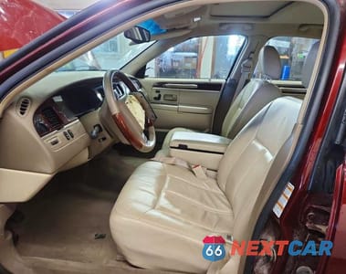 Zdjęcie 7 z 12 samochodu: 2004 LINCOLN TOWN CAR ULTIMATE VIN:1LNHM83W54Y662066 - miniatura