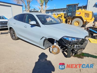 Czwarte zdjęcie samochodu z boku: 2026 BMW X6 XDRIVE40I VIN:5UX33EX06T9234889 - miniatura