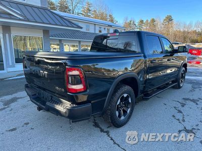 Czwarte zdjęcie samochodu z boku: 2019 RAM 1500 REBEL 4X4 5'7 BOX VIN:1C6SRFLT7KN629243 - miniatura