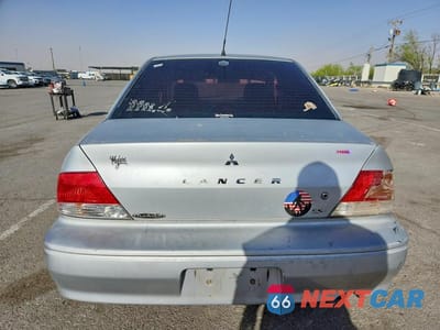 Zdjęcie 6 z 12 samochodu: 2002 MITSUBISHI LANCER ES VIN:JA3AJ26EX2U081602 - miniatura