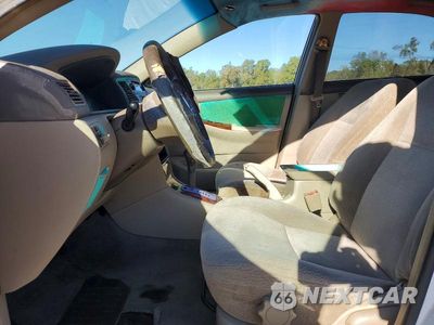 Zdjęcie 7 z 13 samochodu: 2003 TOYOTA COROLLA LE VIN:1NXBR32E83Z152013 - miniatura