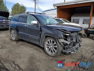 Czwarte zdjęcie samochodu z boku: 2017 JEEP GRAND CHEROKEE OVERLAND VIN:1C4RJFCG0HC739640 - miniatura