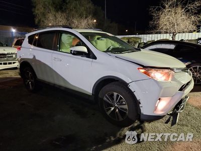 Czwarte zdjęcie samochodu z boku: 2018 TOYOTA RAV4 XLE VIN:JTMRFREV6JJ730053 - miniatura