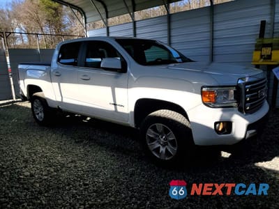 Czwarte zdjęcie samochodu z boku: 2016 GMC CANYON SLE VIN:1GTG5CEA7G1209498 - miniatura