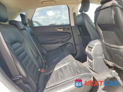 Zdjęcie 11 z 14 samochodu: 2021 FORD EDGE SEL VIN:2FMPK3J93MBA43836 - miniatura