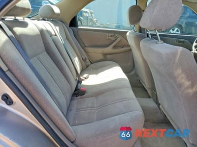 Zdjęcie 10 z 11 samochodu: 2000 TOYOTA CAMRY LE VIN:JT2BG22K3Y0523872 - miniatura