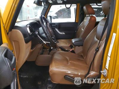 Zdjęcie 7 z 15 samochodu: 2014 JEEP WRANGLER UNLIMITED SAHARA VIN:1C4HJWEG0EL203579 - miniatura