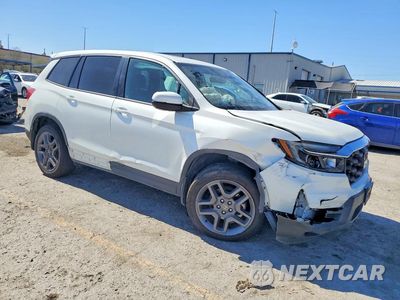 Czwarte zdjęcie samochodu z boku: 2022 HONDA PASSPORT EXL VIN:5FNYF7H50NB005542 - miniatura