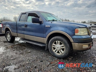 Czwarte zdjęcie samochodu z boku: 2004 FORD F150 VIN:1FTPX14574NB41744 - miniatura