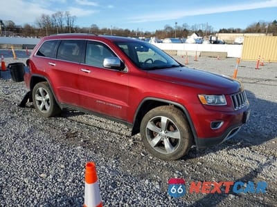 Czwarte zdjęcie samochodu z boku: 2014 JEEP GRAND CHEROKEE LIMITED VIN:1C4RJFBG6EC101860 - miniatura