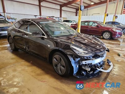 Czwarte zdjęcie samochodu z boku: 2020 TESLA MODEL 3 VIN:5YJ3E1EA0LF792131 - miniatura