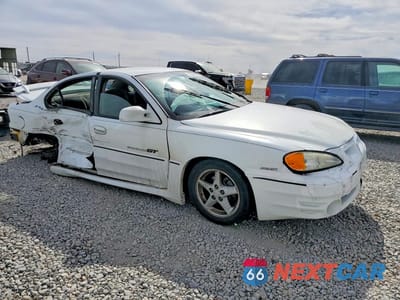 Czwarte zdjęcie samochodu z boku: 2000 PONTIAC GRAND AM GT VIN:1G2NW52E3YM747577 - miniatura