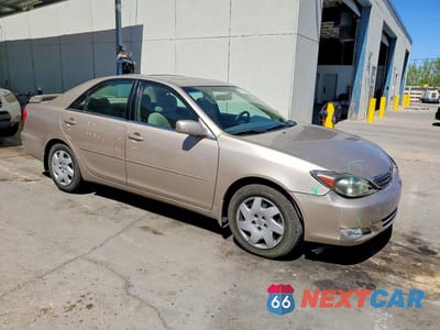 Czwarte zdjęcie samochodu z boku: 2002 TOYOTA CAMRY SE VIN:4T1BE32K12U056322 - miniatura