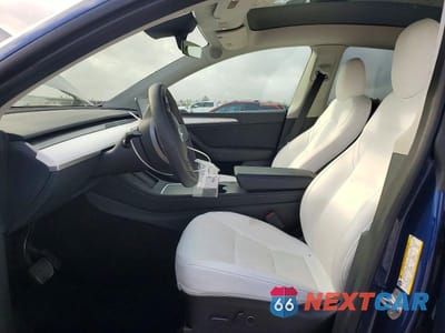 Zdjęcie 7 z 14 samochodu: 2023 TESLA MODEL Y VIN:7SAYGDEE7PF620188 - miniatura