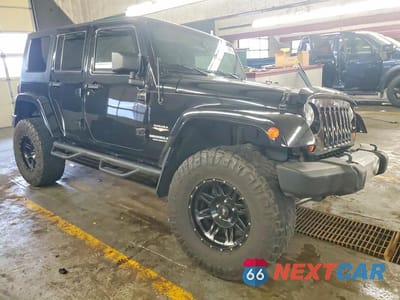 Czwarte zdjęcie samochodu z boku: 2010 JEEP WRANGLER UNLIMITED SAHARA VIN:1J4BA5H12AL122496 - miniatura