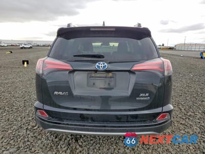 Zdjęcie 6 z 14 samochodu: 2018 TOYOTA RAV4 HYBRID XLE VIN:JTMRJREV4JD157327 - miniatura