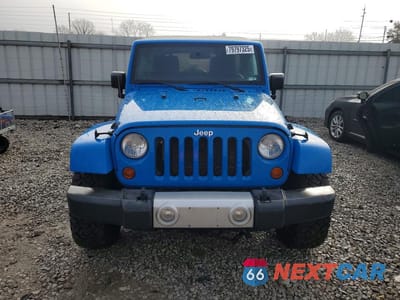 Piąte zdjęcie samochodu w środku: 2011 JEEP WRANGLER UNLIMITED SAHARA VIN:1J4BA5H1XBL548650 - miniatura