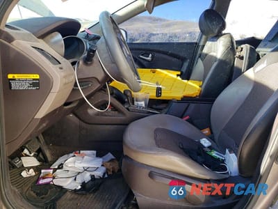 Zdjęcie 7 z 14 samochodu: 2011 HYUNDAI TUCSON GLS VIN:KM8JU3AC8BU173940 - miniatura