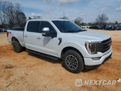 Czwarte zdjęcie samochodu z boku: 2022 FORD F150 LARIAT VIN:1FTFW1E81NKE18530 - miniatura