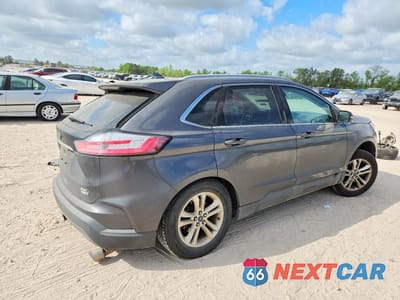 Trzecie zdjęcie samochodu z tyłu: 2020 FORD EDGE SEL VIN:2FMPK4J98LBA41441 - miniatura