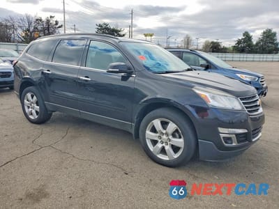 Czwarte zdjęcie samochodu z boku: 2017 CHEVROLET TRAVERSE LT VIN:1GNKRGKD4HJ185268 - miniatura