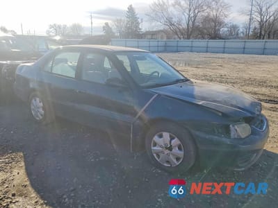 Czwarte zdjęcie samochodu z boku: 2001 TOYOTA COROLLA LE VIN:2T1BR12E21C417091 - miniatura