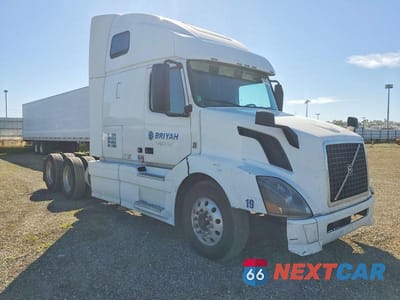 2014 VOLVO VNL SEMI TRUCK 4V4NC9EH7EN174971 - główne zdjęcie licytacji z USA - miniatura