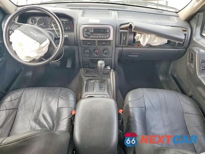 Zdjęcie 8 z 14 samochodu: 2004 JEEP GRAND CHEROKEE LAREDO VIN:1J4GX48S14C204912 - miniatura