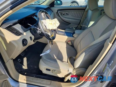 Zdjęcie 7 z 12 samochodu: 2013 FORD TAURUS SEL VIN:1FAHP2E84DG110660 - miniatura