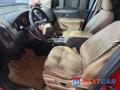 Zdjęcie 7 z 11 samochodu: 2010 FORD EDGE SEL VIN:2FMDK3JC4ABA20043 - miniatura