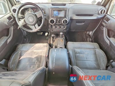 Zdjęcie 8 z 12 samochodu: 2012 JEEP WRANGLER UNLIMITED SAHARA VIN:1C4BJWEG6CL188752 - miniatura