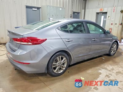 Trzecie zdjęcie samochodu z tyłu: 2018 HYUNDAI ELANTRA VALUE EDITION VIN:5NPD84LF0JH396078 - miniatura