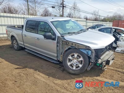 Czwarte zdjęcie samochodu z boku: 2015 FORD F150 SUPERCREW VIN:1FTFW1EG0FFC82098 - miniatura