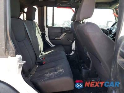 Zdjęcie 10 z 12 samochodu: 2013 JEEP WRANGLER UNLIMITED SPORT VIN:1C4BJWDG4DL630219 - miniatura