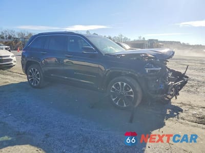 Czwarte zdjęcie samochodu z boku: 2023 JEEP GRAND CHEROKEE OVERLAND 4XE VIN:1C4RJYD69P8795109 - miniatura