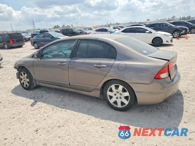 Drugie zdjęcie samochodu z przodu: 2010 HONDA CIVIC LX VIN:19XFA1F51AE082412 - miniatura