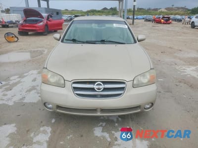 Piąte zdjęcie samochodu w środku: 2002 NISS MAXIMA GXE VIN:JN1DA31D12T203274 - miniatura