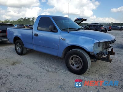 Czwarte zdjęcie samochodu z boku: 1997 FORD F150 VIN:1FTDF1723VND40315 - miniatura