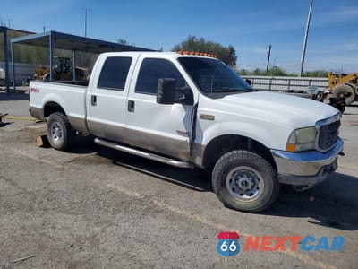 Czwarte zdjęcie samochodu z boku: 2003 FORD F250 SUPER DUTY VIN:1FTNW21P93ED80765 - miniatura