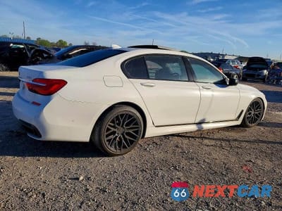 Trzecie zdjęcie samochodu z tyłu: 2019 BMW 750 XI VIN:WBA7F2C58KB239932 - miniatura