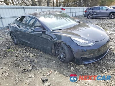 Czwarte zdjęcie samochodu z boku: 2019 TESLA MODEL 3 VIN:5YJ3E1EB5KF231463 - miniatura
