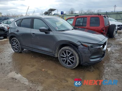 Czwarte zdjęcie samochodu z boku: 2017 MAZDA CX-5 GRAND TOURING VIN:JM3KFBDLXH0147985 - miniatura