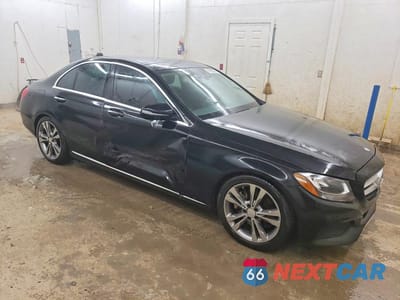 Czwarte zdjęcie samochodu z boku: 2016 MERCEDES-BENZ C 300 4MATIC VIN:55SWF4KB9GU142582 - miniatura