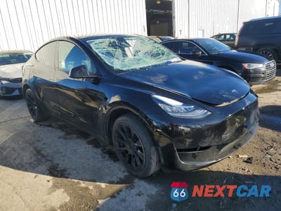 Czwarte zdjęcie samochodu z boku: 2022 TESLA MODEL Y VIN:7SAYGDEE6NA014407 - miniatura
