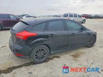 Trzecie zdjęcie samochodu z tyłu: 2016 FORD FOCUS SE VIN:1FADP3K20GL241374 - miniatura