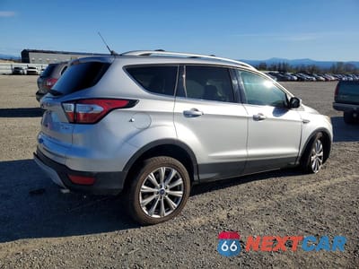 Trzecie zdjęcie samochodu z tyłu: 2018 FORD ESCAPE TITANIUM VIN:1FMCU9J92JUC62319 - miniatura