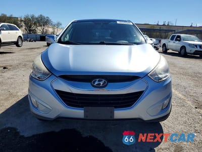 Piąte zdjęcie samochodu w środku: 2011 HYUNDAI TUCSON LIMITED VIN:KM8JU3AC2BU275721 - miniatura