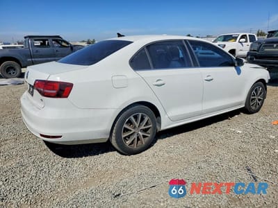 Trzecie zdjęcie samochodu z tyłu: 2017 VOLKSWAGEN JETTA SE VIN:3VWDB7AJ2HM255198 - miniatura