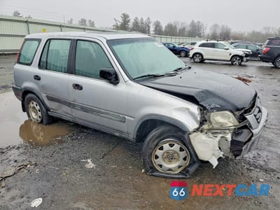 Czwarte zdjęcie samochodu z boku: 2001 HONDA CR-V LX VIN:JHLRD18461C052423 - miniatura